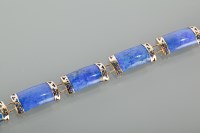 Lot 1247 - NINE CARAT GOLD MOUNTED LAPIS LAZULI BRACELET...
