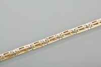 Lot 1248 - EIGHTEEN CARAT GOLD BRACELET with pierced...
