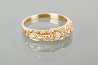 Lot 1255 - EIGHTEEN CARAT GOLD DIAMOND FIVE STONE RING...