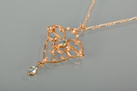 Lot 1256 - EDWARDIAN AQUAMARINE AND SEED PEARL HOLBEIN of...