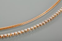 Lot 1273 - NINE CARAT GOLD CHAIN along with a nine carat...