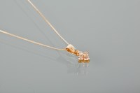 Lot 1278 - DIAMOND CLUSTER PENDANT set with four...