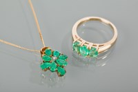 Lot 1284 - EMERALD AND DIAMOND CLUSTER PENDANT set with a...