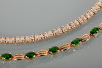 Lot 1286 - TWO GOLD GEM SET BRACELETS one set with small...