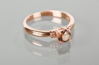 Lot 1294 - COGNAC DIAMOND SOLITAIRE RING set with a...