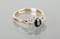 Lot 1319 - SAPPHIRE AND DIAMOND THREE STONE RING set with...