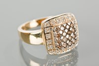 Lot 1321 - COLOURED DIAMOND DRESS RING the square bezel...
