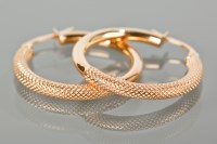 Lot 1337 - PAIR OF NINE CARAT GOLD HOOP EARRINGS with a...