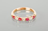 Lot 1342 - RUBY AND DIAMOND HALF ETERNITY RING set with...