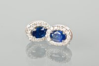 Lot 1375 - PAIR OF SAPPHIRE AND DIAMOND CLUSTER EARRINGS...