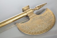 Lot 172 - PERSIAN BRASS AXE the crescent bladed section...