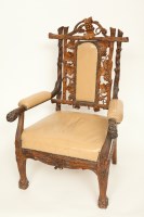 Lot 319 - 19TH CENTURY BLACK FOREST CARVED OAK ARMCHAIR...