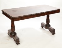 Lot 413 - REGENCY ROSEWOOD LIBRARY TABLE the gadrooned...