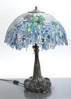 Lot 388 - TIFFANY STYLE BRONZE AND COLOURED GLASS TABLE...