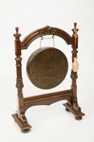 Lot 392 - VICTORIAN FLORAL CARVED OAK GONG of arched...