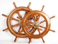 Lot 410 - TWO BRASS MOUNTED EIGHT SPOKE SHIPS WHEELS the...