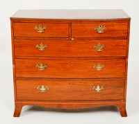 Lot 428 - REGENCY BOWFRONT MAHOGANY CHEST with two short...