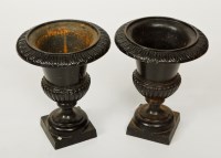 Lot 467 - PAIR OF VICTORIAN CAST IRON GARDEN UNS painted...