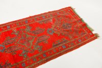 Lot 472 - TURKISH USHAK RUNNER with red ground, 346cm kong