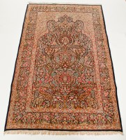 Lot 479 - PERSIAN RUG with dense floral mihrab design,...