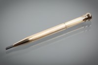 Lot 1111 - TIFFANY AND CO. FOURTEEN CARAT GOLD PENCIL...