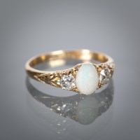 Lot 1115 - VICTORIAN OPAL AND DIAMOND THREE STONE RING...