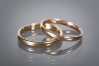 Lot 1130 - EIGHTEEN CARAT GOLD WEDDING BAND along with...