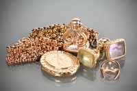 Lot 1139 - TWO GOLD WATCH CHAINS, THREE FOBS, A LOCKET...