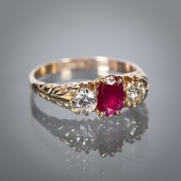 Lot 1140 - VICTORIAN STYLE RUBY AND DIAMOND THREE STONE...