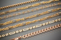 Lot 1163 - SIX NINE CARAT GOLD CHAIN NECKLACES along with...