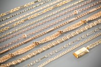 Lot 1165 - TEN NINE CARAT GOLD NECKLACES AND THREE NINE...