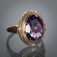 Lot 1193 - AMETHYST DRESS RING set with a large oval...