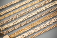 Lot 1205 - THIRTEEN NINE CARAT GOLD BRACELETS some with...