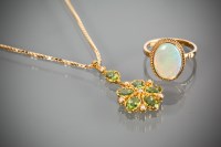 Lot 1209 - PERIDOT AND SEED PEARL SET PENDANT NECKLACE...