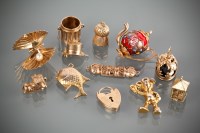 Lot 1236 - LOT OF GOLD CHARMS including Mickey Mouse, a...
