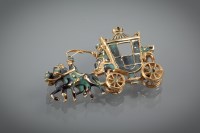 Lot 1244 - ENAMELLED HORSE AND CARRIAGE BROOCH enamelled...