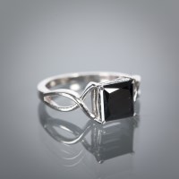 Lot 1282 - BLACK DIAMOND DRESS RING the French cut black...