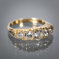 Lot 1286 - VICTORIAN DIAMOND FIVE STONE RING the...