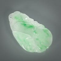 Lot 1312 - CHINESE CARVED JADE PENDANT multi-tonal green...