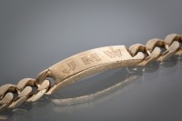 Lot 1327 - NINE CARAT GOLD IDENTITY BRACELET with...