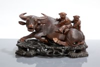 Lot 8 - JAPANESE WOOD CARVING of a buffalo with two...