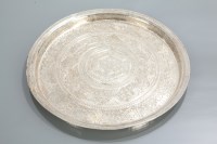 Lot 100 - CAIRO WARE SILVERED CHARGER of circular form...