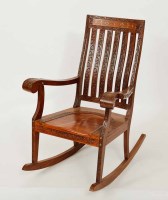 Lot 135 - INDIAN WOOD ROCKING CHAIR with slat back and...