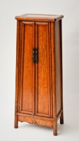 Lot 209 - CHINESE HARDWOOD CABINET of tapering form with...
