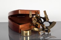 Lot 275 - MODERN BLACK STEEL AND BRASS SEXTANT in a teak...