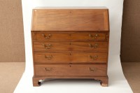 Lot 371 - GEORGE III MAHOGANY BUREAU the fall enclosing...