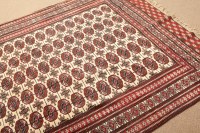 Lot 375 - MODERN BOKHARA RUG the ivory field with five...