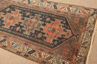 Lot 376 - KASHQAI RUG the indigo field with row of three...