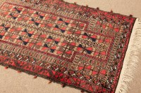 Lot 378 - BELOUCH PRAYER RUG with geometric field,145cm...