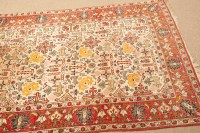 Lot 387 - PERSIAN RUG the cream field with birds and...